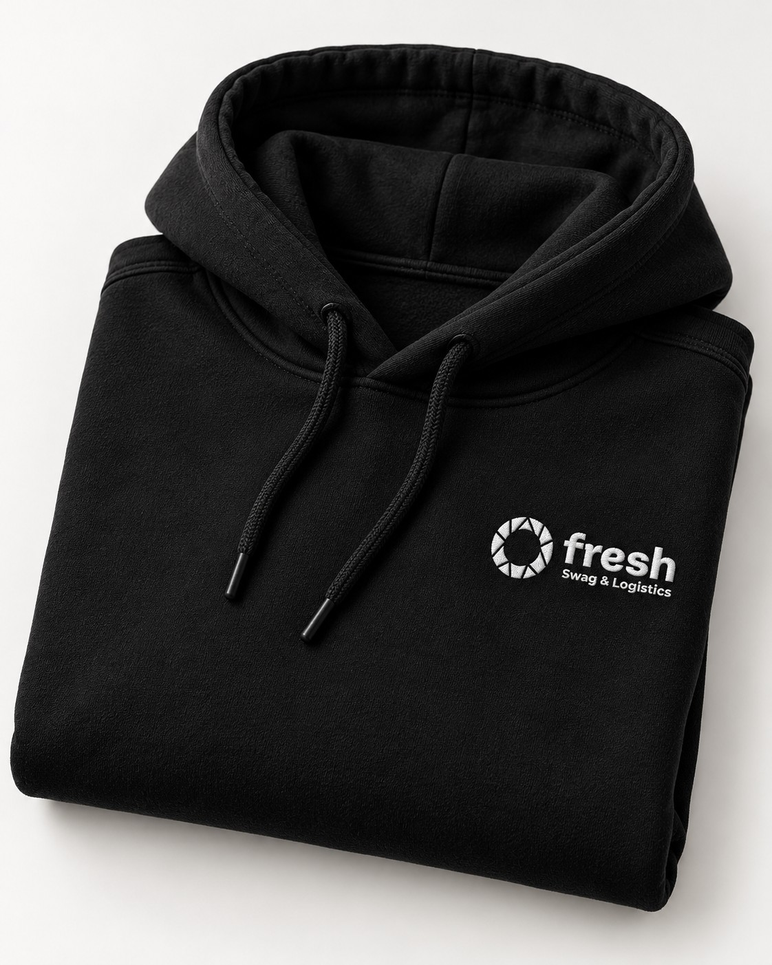 Folded black hoodie with an embroidered logo